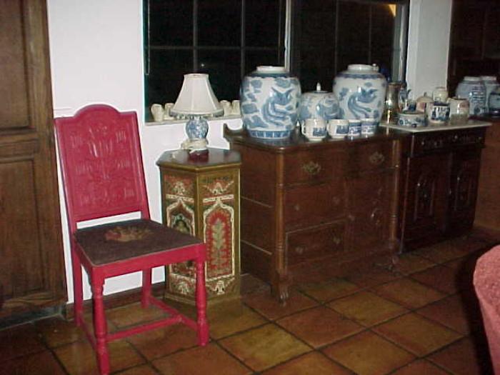 Collection of modern blue and white decorative china, and Blue Willow. Red painted Tudor style vintage oak dining side chair