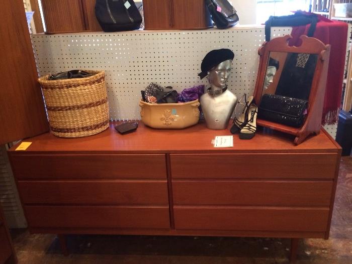Mid-century teak dresser, vintage purses and hats.