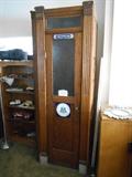 Antique phone booth with frosted glass and 3 slot payphone