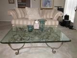 Glass and iron coffee table, sofa