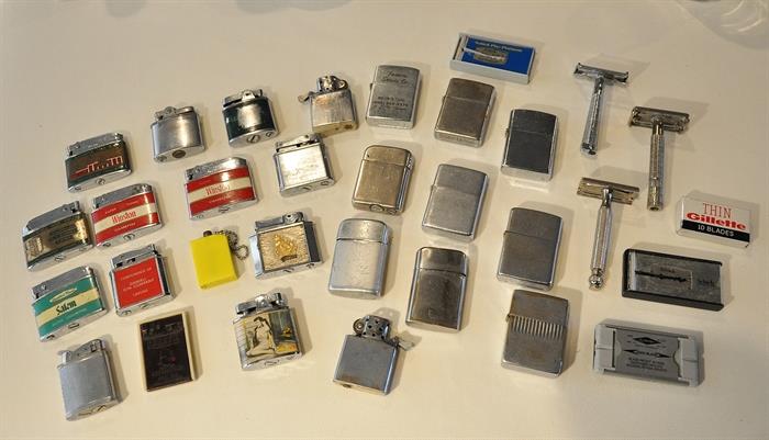 A collection of Zippo and advertising lighters, 1 pinup lighter, vintage razors and razor blades