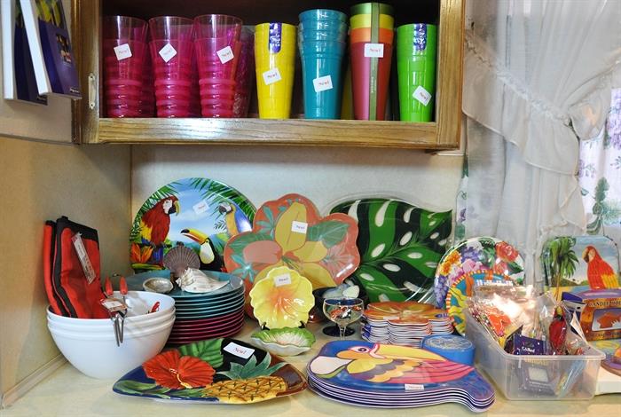 The tropical or summer party corner - you will be ready for summer fun if you stock up on all the new tropical themed items - tumblers, trays, plates, napkins, serving dishes, party picks and umbrellas for tropical drinks.