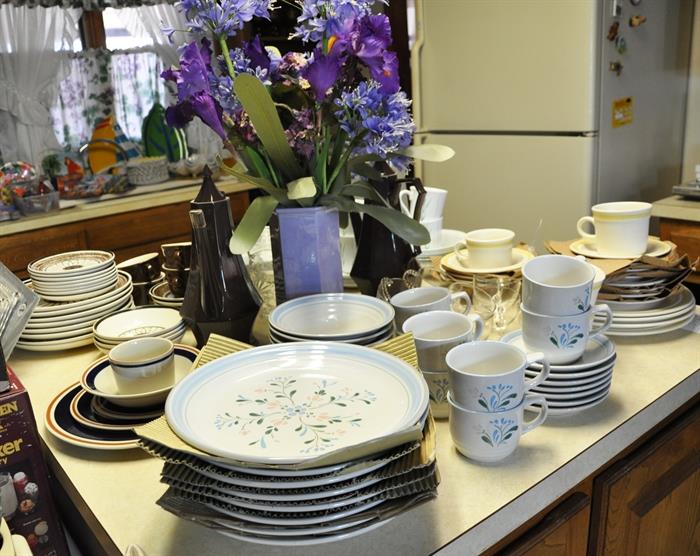 There are multiple sets of dinnerware, some new and also parts of others.