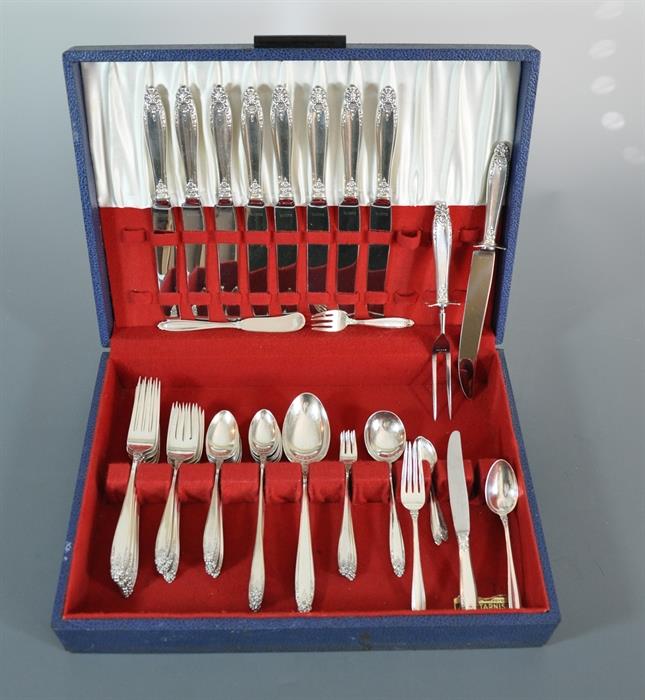 Last but not least is the sterling flatware by International in the Prelude pattern.  There is a service for 8 plus iced tea spoons, seafood forks, carving set, junior place setting and a couple of other pieces.