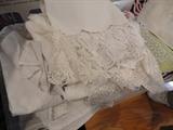 Lots of Linens and Fancy work 