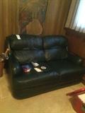 #100 blue leather loveseat $250