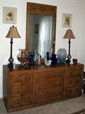 Walnut dresser with long mirror and lots of drawers.  Very well made.