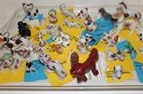 A great collection of porcelain dogs from Occupied Japan, Japan and Red Japan.