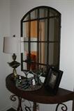 Beautiful metal table with large round mirror that is metal.  Has metal tray and lovely Laddin metal lamp.