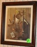 A lovely picture with the violin along with collectible items.