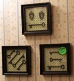 Framed keys in the bathroom.