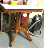 Pair of marble top Eastlake tables