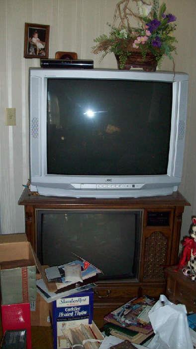 2 console tvs, possibly 3
