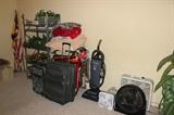 Suitcases, heaters, fans, blankets, blanket rack, vacuum, flags, walking sticks