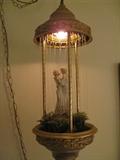 Vintage lamp with rotating figure