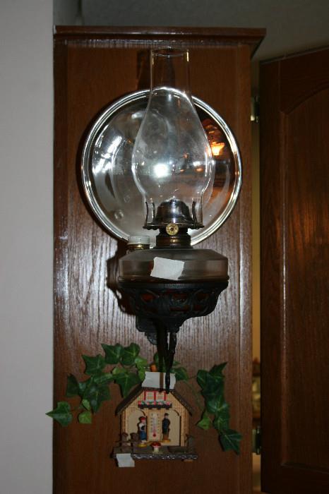 Oil lamp & iron sconce, small Swiss clock
