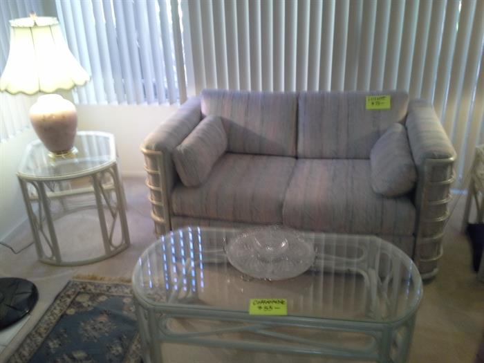 Loveseat...rattan coffeetable with glass top...matching end tables..60% OFF