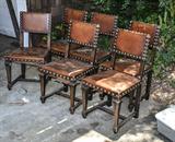 Set of six leather chairs.