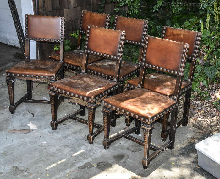 Set of six leather chairs.