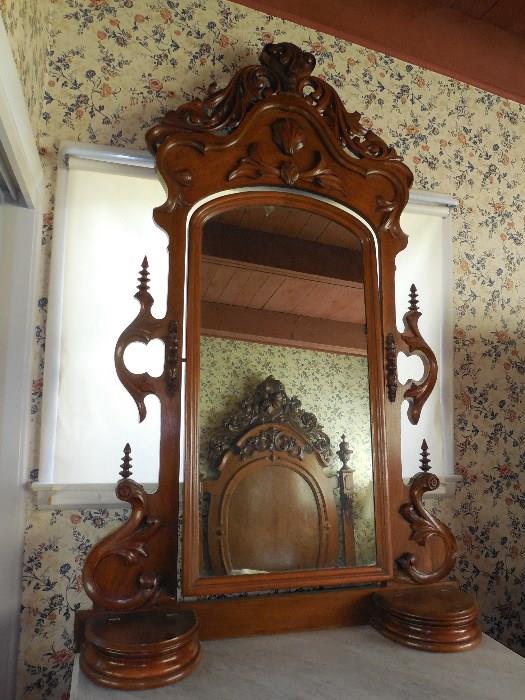 Closeup of mirror of Walnut Victorian Bureau or Dresser.