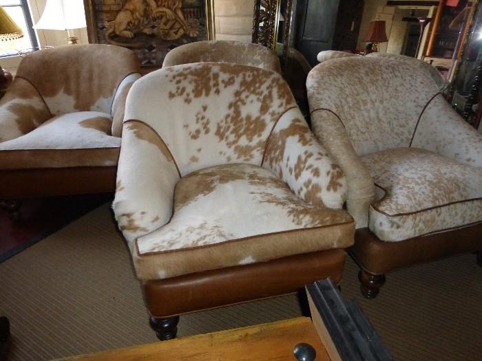 Cowhide and leather lounge chairs (sold as set of 4 or in pairs)