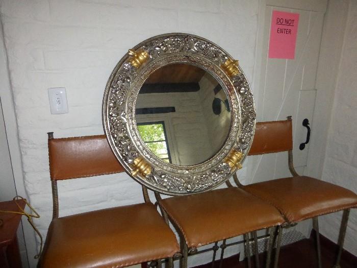 3 bar stools and a beautiful round metal framed mirror