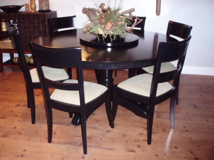 60 inch pedestal table purchased 2011 Pottery Barn with Meyer side Black chairs made in italy
