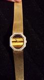 Piaget 18k yellow gold diamond tiger eye watch