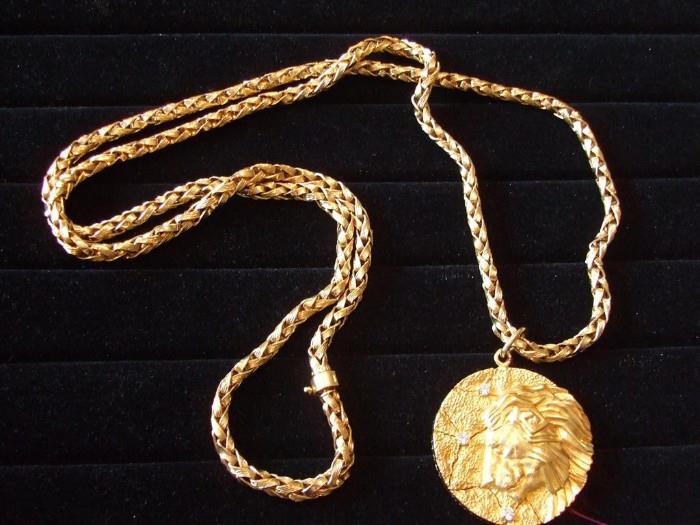 Tiffany & Co. heavy gold necklace & lion pendant