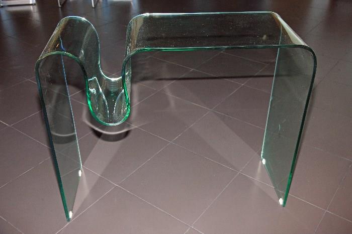 This desk with class is formed out of one piece of glass.