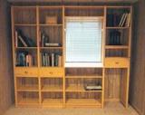 Skandia light wood wall unit; shelves, storage modules and three drawers.  Overall size: 72" wide x 7' 11" tall.