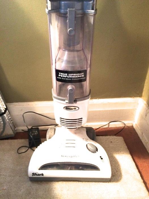 One of two Shark Vacuum Cleaners