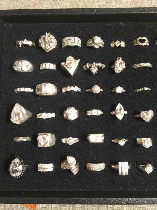 Sterling silver rings (cubic zirconia except for far right row, top 4 rings are diamonds) - 50% off