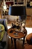 Round oak end table, antique lamps
