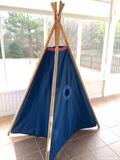 Kids tee-pee tent with wooden supports and canvas "walls"