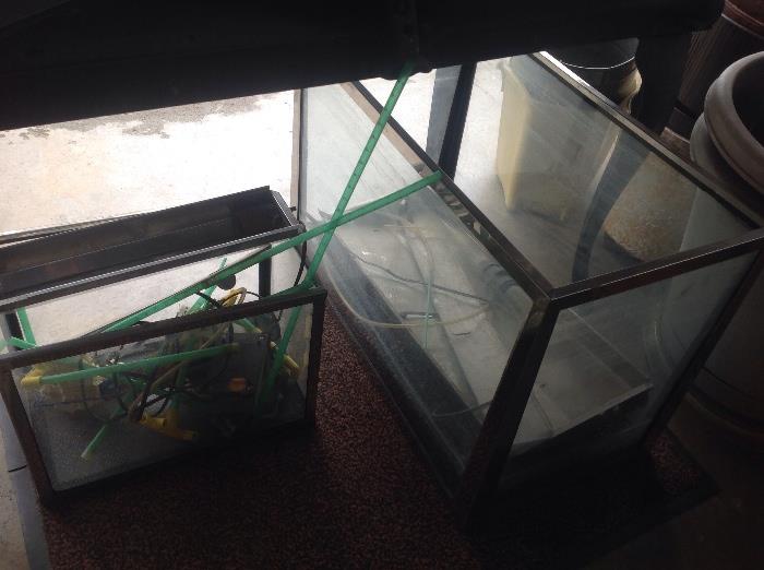 Two nice aquarium tanks - not sure if they are dry or wet ones