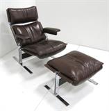 Lot #144 Modern leather & chrome arm chair and ottoman