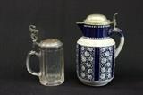 Lot #1019 2 pewter lidded steins