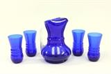 Lot #1059 Pitcher and 4 glasses