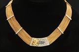 Lot #1185 18K gold diamond sapphire necklace