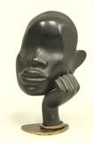 Lot #251 Hagenauer figural bronze mask
