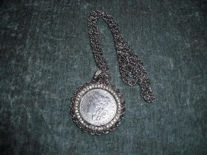 1884 Morgan silver dollar made into a necklace
