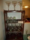 Glass ware on Vintage wood book case/curio