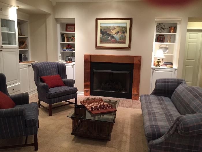 2 wing back chairs and sofa, chicken coop coffee table, Grant Wood print of Stone City