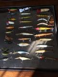 Vintage fishingblures many of which are wooden.