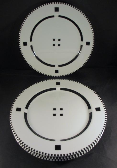 (4) Swid Powell "Tuxedo" Dinner Plates Designed by Gwathmey Seigal