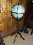 Lighted globe on stand