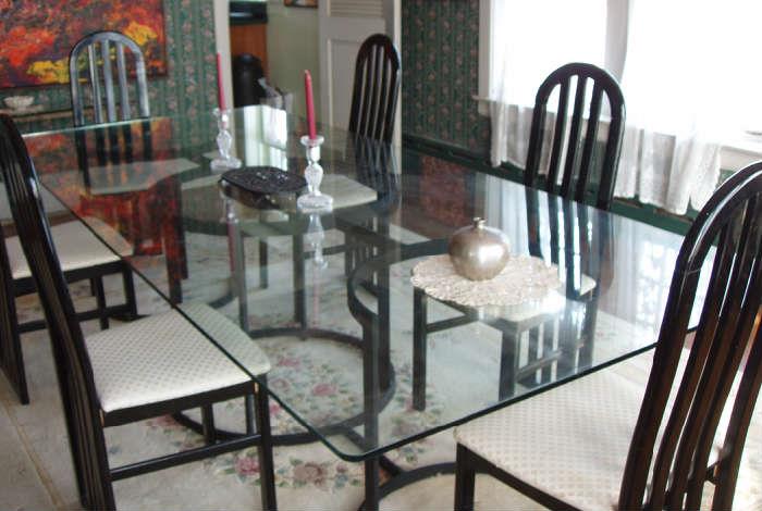 10' glass and iron base diing room table with 10 matching chairs