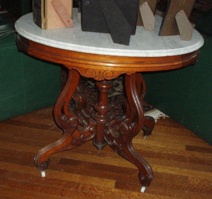 oval top marble top table