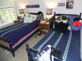 Nautical twin beds that convert to bunk beds.